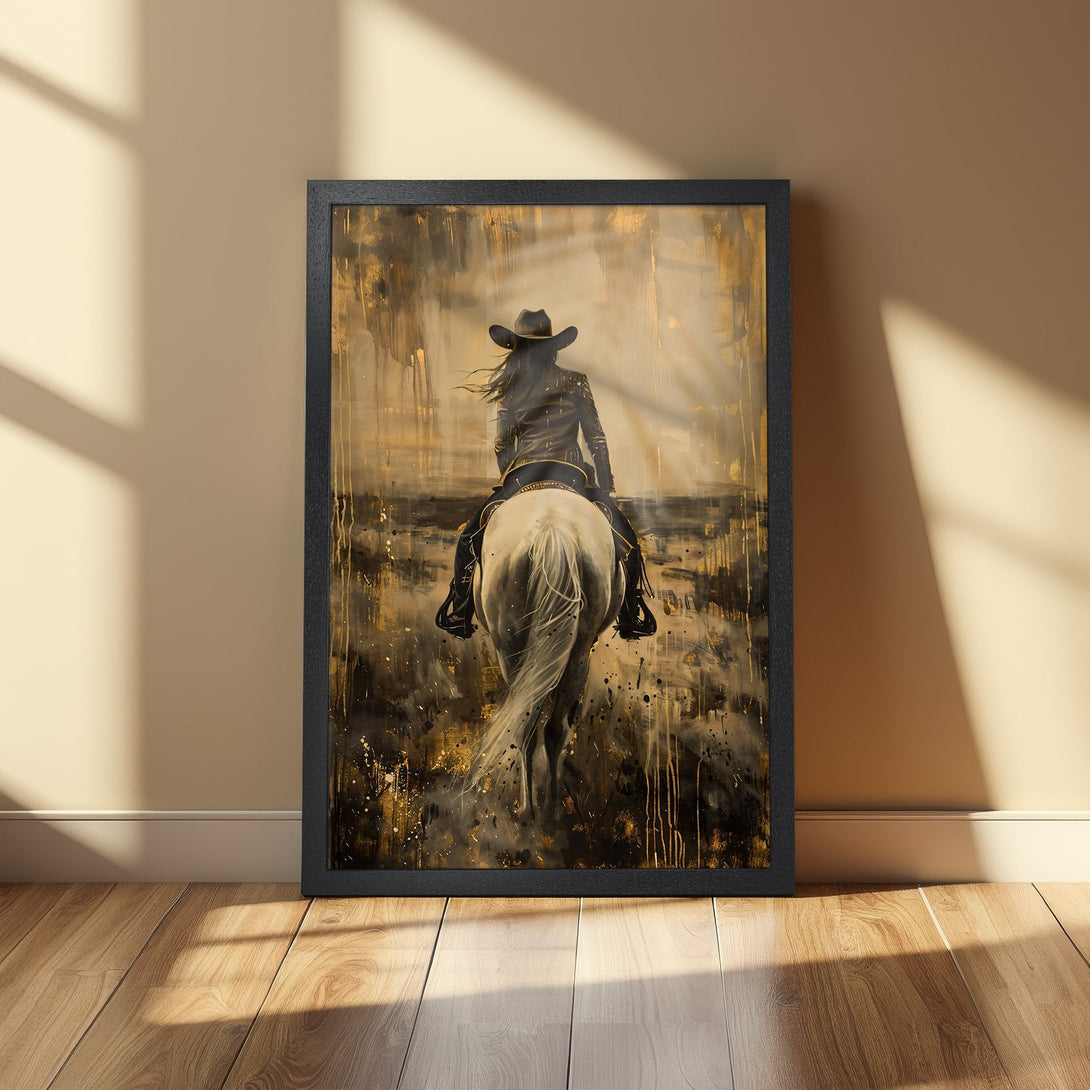 Framed Poster featuring a cowgirl riding a horse, abstract style, gold and black color palette. Add a touch of Western art to your home!