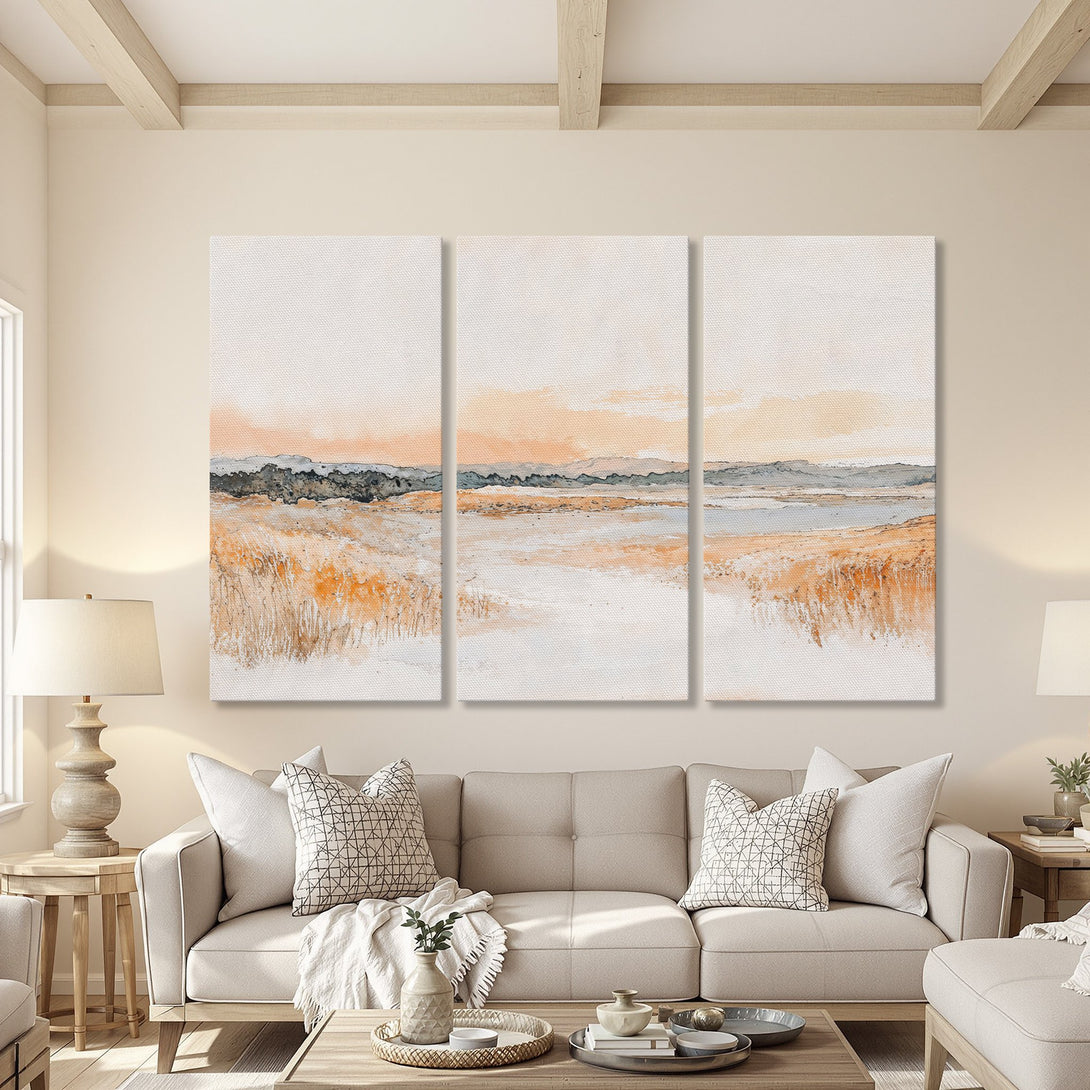 Canvas Print triptych featuring a watercolor landscape in warm orange and gray tones, perfect for adding a touch of nature to your home.
