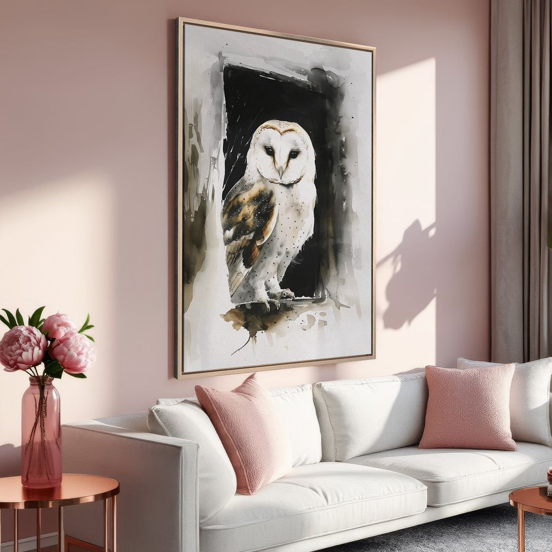 Framed Wall Art: Watercolor owl print in a modern living room. Soft pink and neutral tones create a calming aesthetic. Perfect for adding elegance to your space.