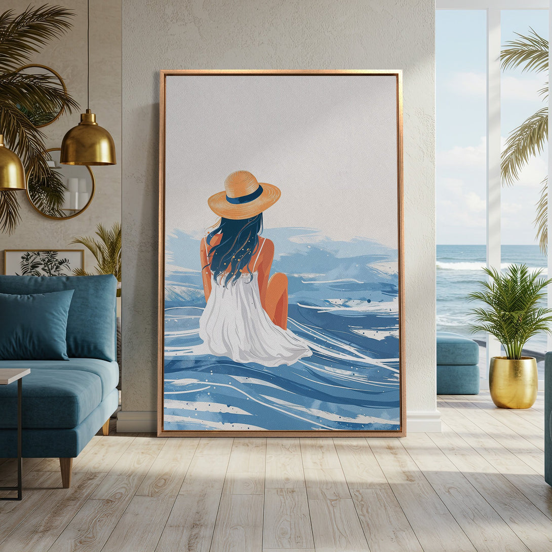 Framed Wall Art featuring a woman by the sea, painted in a serene style with blue and white hues. Perfect coastal decor for a relaxing vibe.