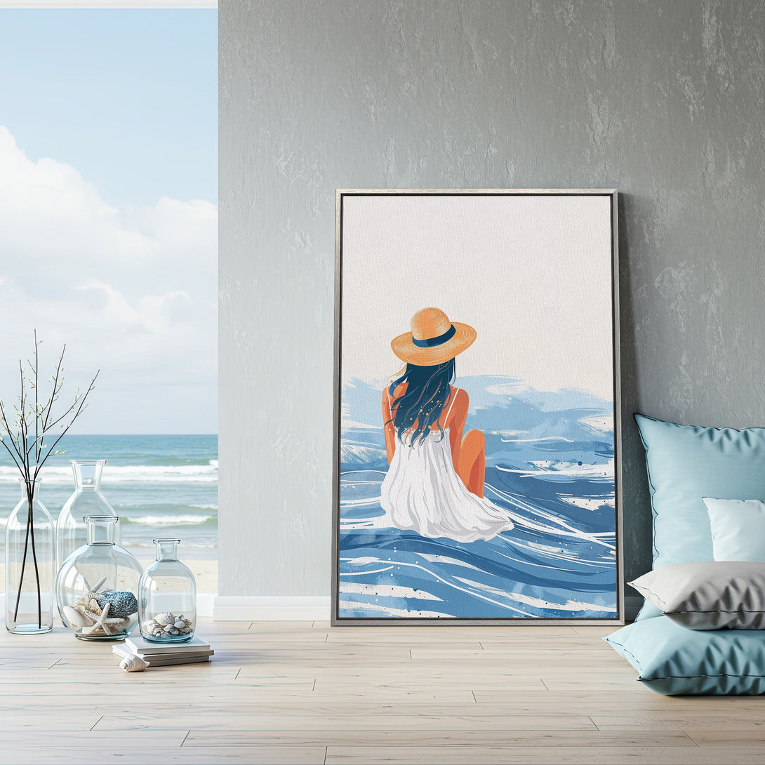 Framed Wall Art: Coastal illustration of a woman in a hat, serene blue and white color palette. Perfect beach house decor!