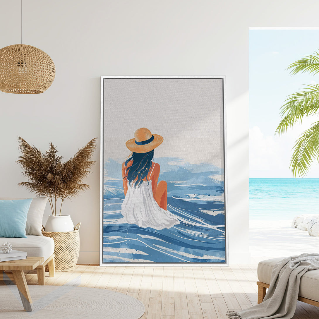 Framed Wall Art: Coastal art print of woman on beach in blue and white. Modern, minimalist style perfect for serene home decor.