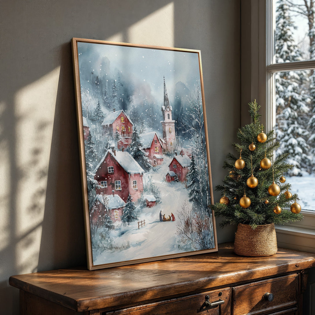 Framed Wall Art: Watercolor winter village scene with red houses, snowy landscape, and cool blue/gray tones. Perfect holiday decor!