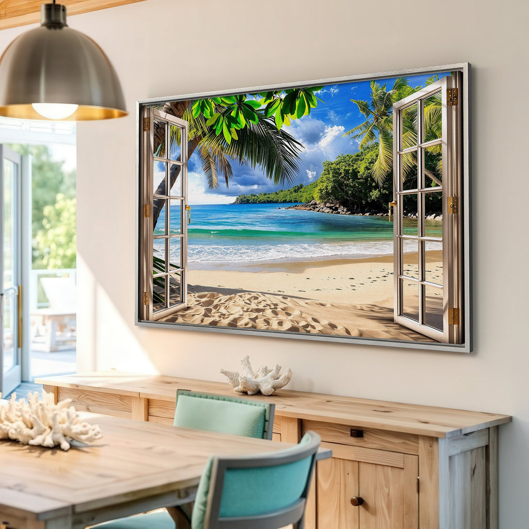 Framed Wall Art: Tropical beach scene canvas print with blue ocean, green palm trees, and sandy shore. Coastal decor in a bright, inviting color palette.