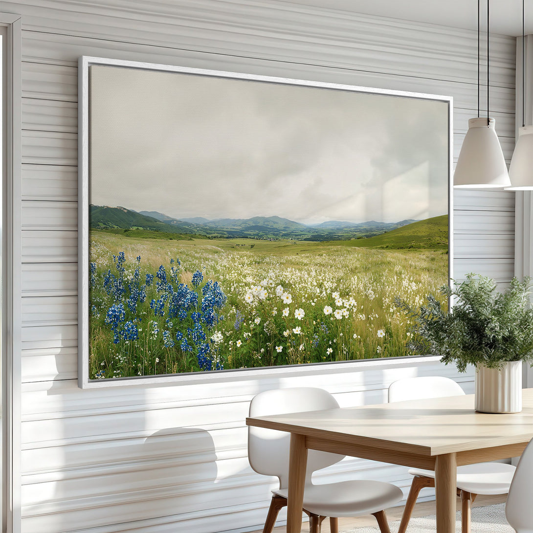 Framed Wall Art featuring a serene landscape with wildflowers in a green and blue color palette. Perfect for adding a touch of nature to your home!