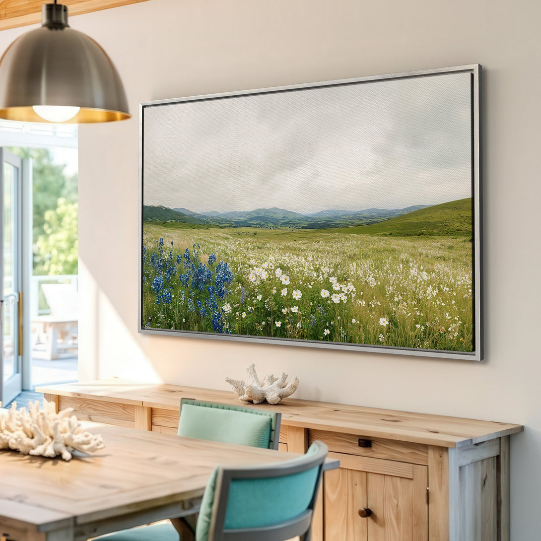 Framed Wall Art featuring a serene landscape with wildflowers in a natural, neutral color palette. Add a touch of nature to your home!