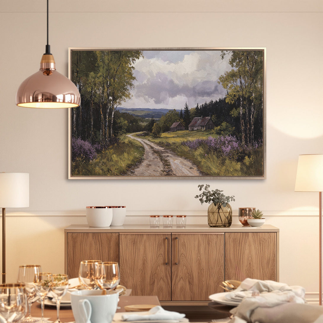 Framed Wall Art: Landscape painting with a country road, trees, and houses. Earthy tones with pops of purple and green. Perfect for home decor.