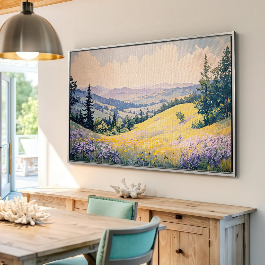 Framed Wall Art: Watercolor landscape Canvas Print in a bright interior. Featuring rolling hills, yellow and purple flowers, and a soft color palette.
