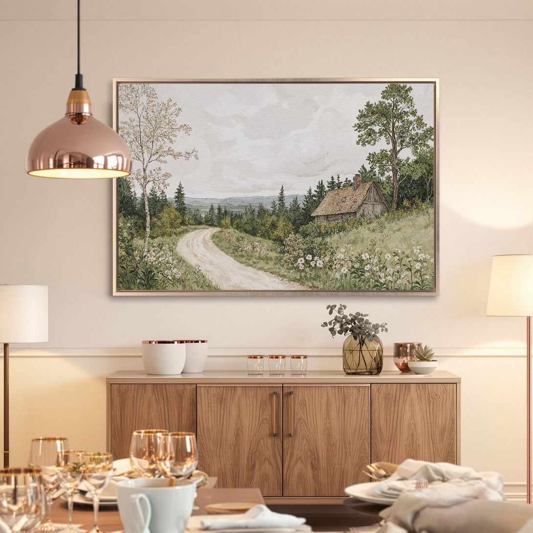 Framed Wall Art: Rustic landscape canvas print in neutral tones. Perfect for farmhouse decor, featuring a scenic road and cabin in a serene setting.