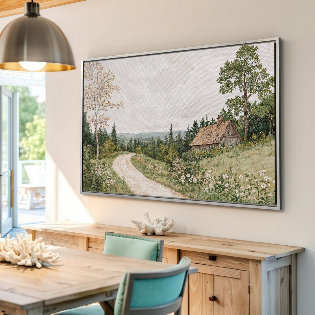 Framed Wall Art: Rustic landscape Canvas Print with a cabin, road, and trees in a neutral color palette. Perfect for adding a touch of nature to your home.