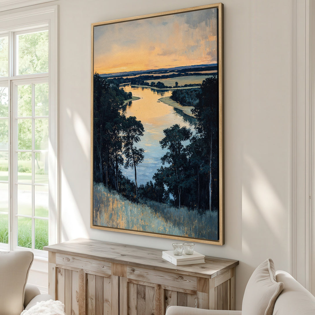 Framed Wall Art: Landscape painting with a river, trees, and sunset in a blue, gold, and green color palette. Perfect for adding a touch of nature to your home.
