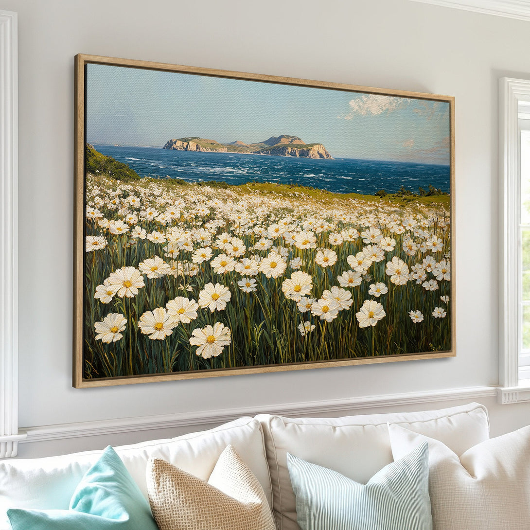 Framed Wall Art: Coastal landscape Canvas Print with white daisy field, blue sea, and sky. Serene, impressionistic style with a natural color palette.