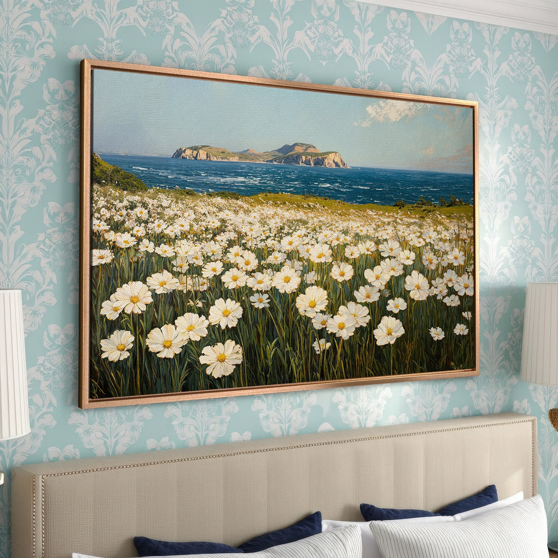 Framed Wall Art: Coastal landscape Canvas Print with white daisies, blue sea, and sky. Serene painting in a calming blue and green palette.