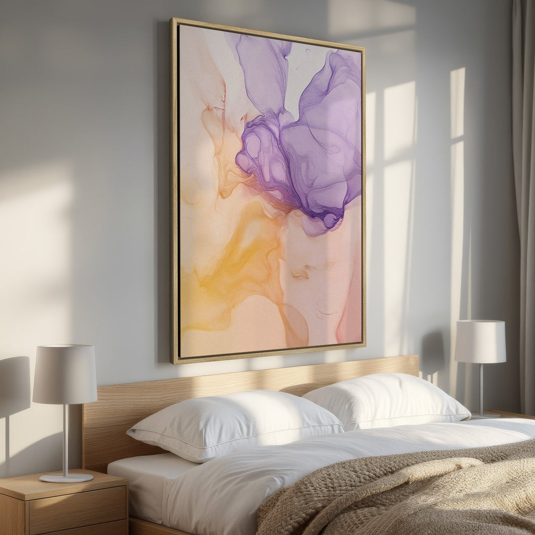 Framed Wall Art featuring an abstract watercolor design in shades of purple, yellow, and peach. Modern art canvas print perfect for bedroom decor.