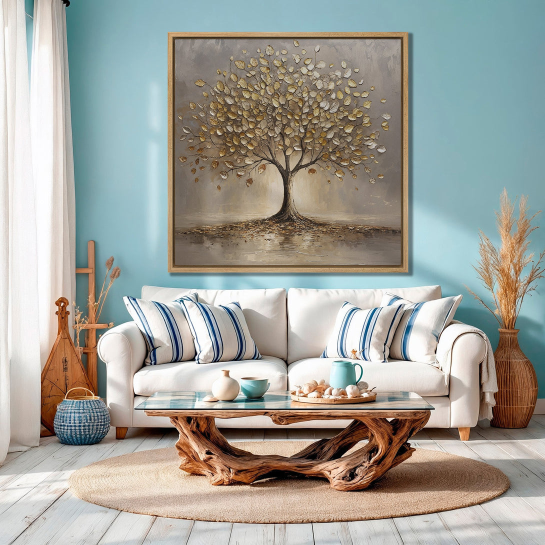 Framed Wall Art of a golden tree painting in a serene living room. Warm neutral and blue color palette, perfect for adding a touch of nature.