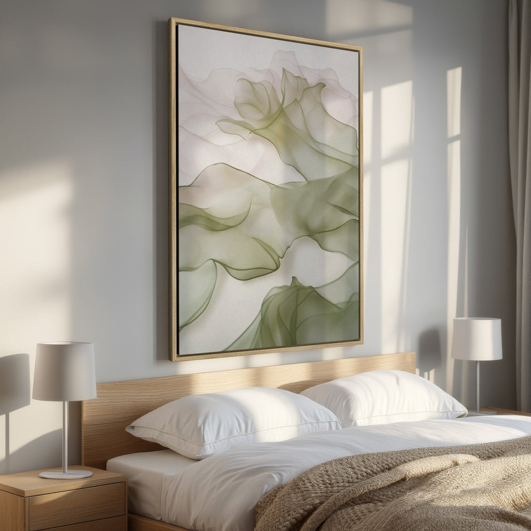 Framed Wall Art featuring an abstract green and blush watercolor design. Modern art print adds a touch of elegance to any bedroom decor.