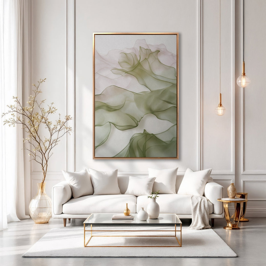 Framed Wall Art: Abstract green and blush canvas print in a modern living room. Enhance your space with elegant, flowing art and a calming color palette.