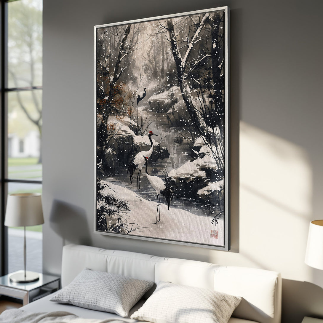 Framed Wall Art featuring a serene winter landscape with cranes. Japanese-inspired art in a muted black, white, and brown color palette. Perfect for home decor.