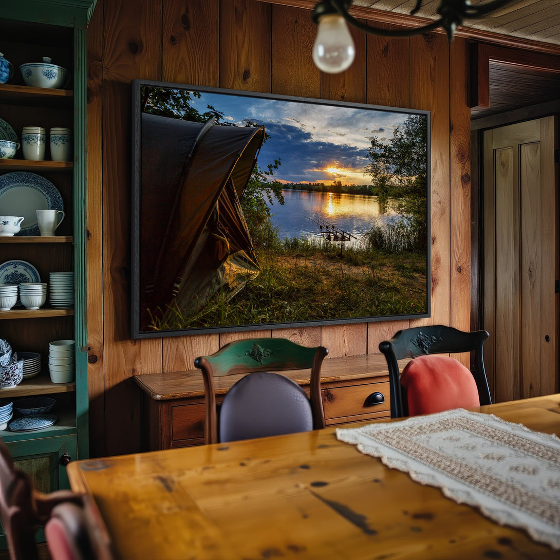 Framed Wall Art: Landscape Canvas Print of a serene lake at sunset. Warm, golden color palette complements the rustic interior.