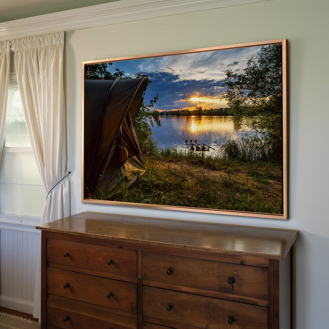 Framed Wall Art: Landscape Canvas Print of a lake at sunset. Warm, golden hues dominate the scene, creating a serene and inviting atmosphere.