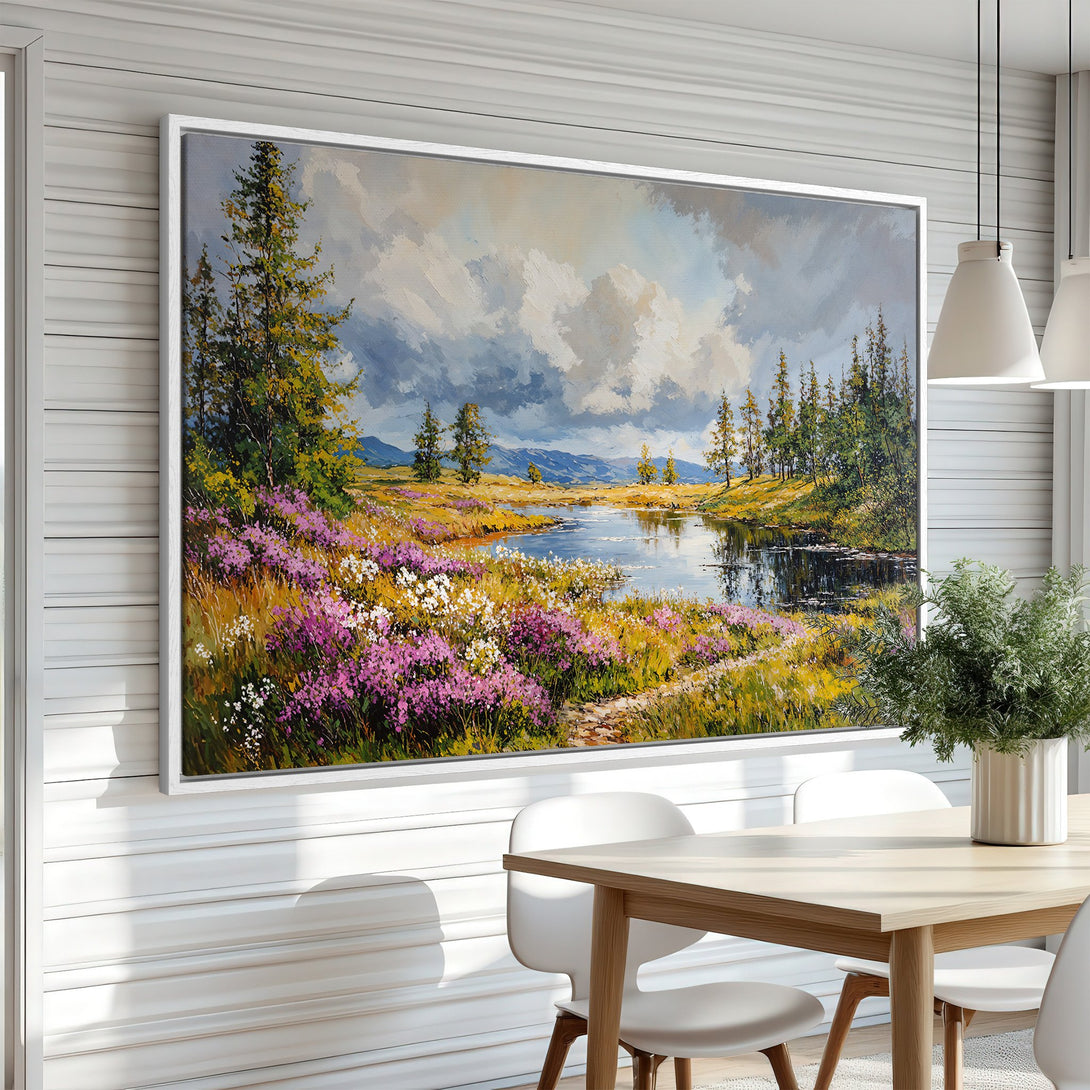 Framed Wall Art: Landscape Canvas Print with vibrant purple flowers, serene lake, and lush greenery. Warm, inviting color palette perfect for home decor.