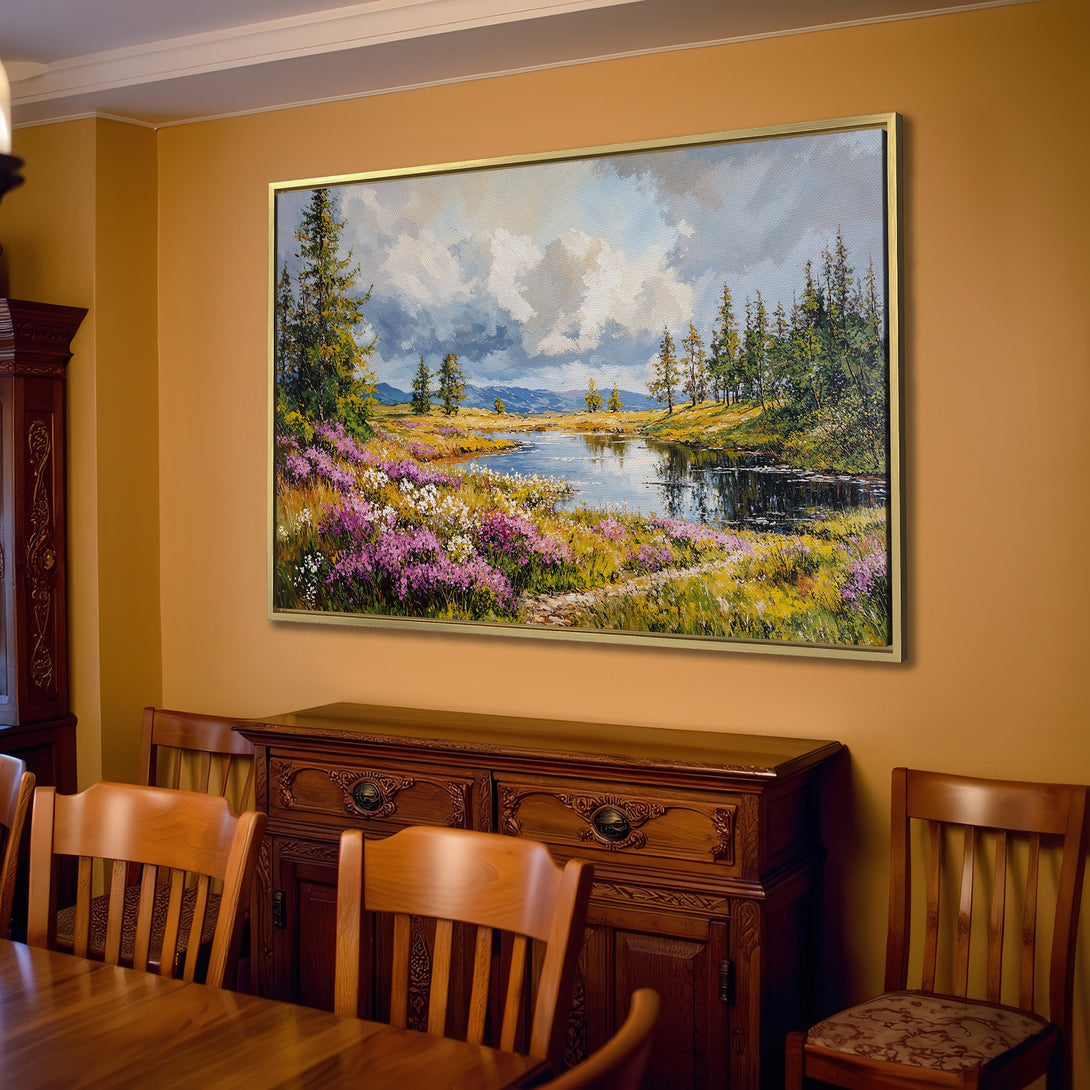 Canvas Print of a serene landscape painting in a living room. Features a lake, trees, and flowers with a warm, natural color palette.