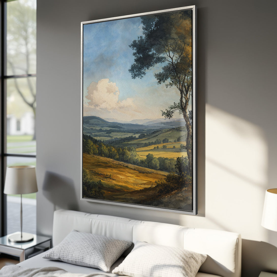 Framed Wall Art: Landscape Canvas Print in a bedroom. Classic style with a warm color palette featuring green hills, blue sky, and golden fields.