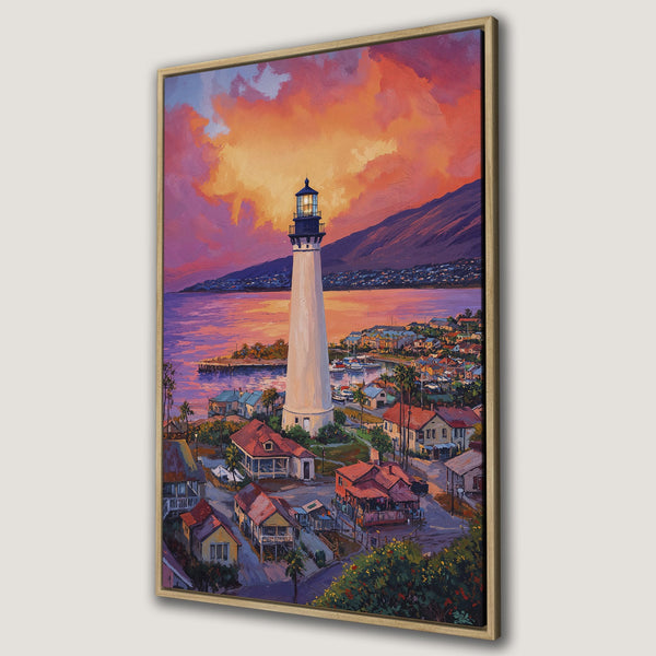 Framed Wall Art of a coastal lighthouse at sunset. Impressionistic style with warm orange, purple, and blue hues. Perfect for adding a touch of serenity.