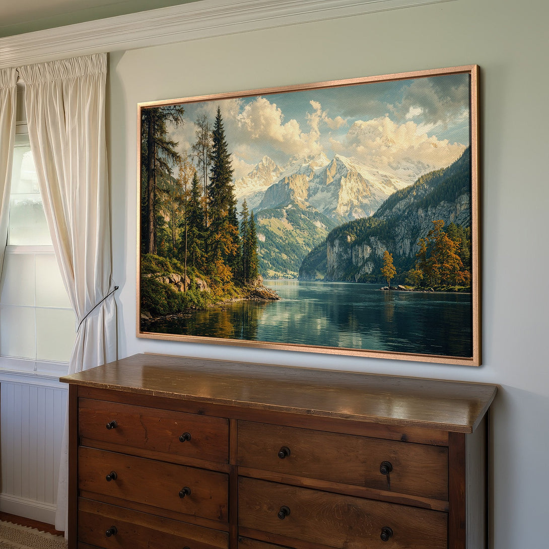 Framed Wall Art: Stunning landscape Canvas Print featuring a serene lake and mountain scene. Earthy tones of green, blue, and gold create a calming, classic aesthetic.