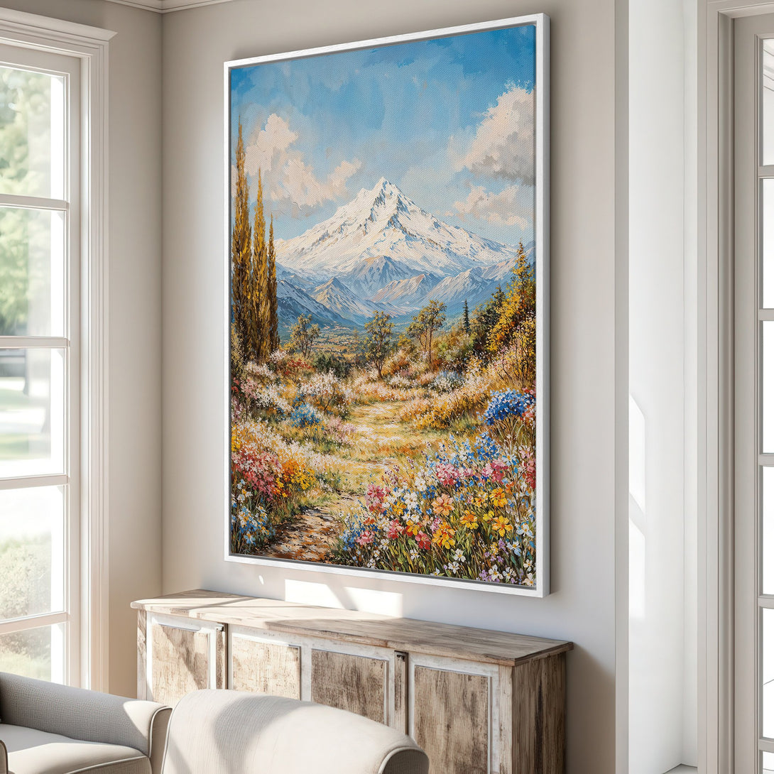 Framed Wall Art: Mountain landscape painting with vibrant wildflowers, blue sky, and a warm color palette. Perfect for adding a touch of nature to your home.