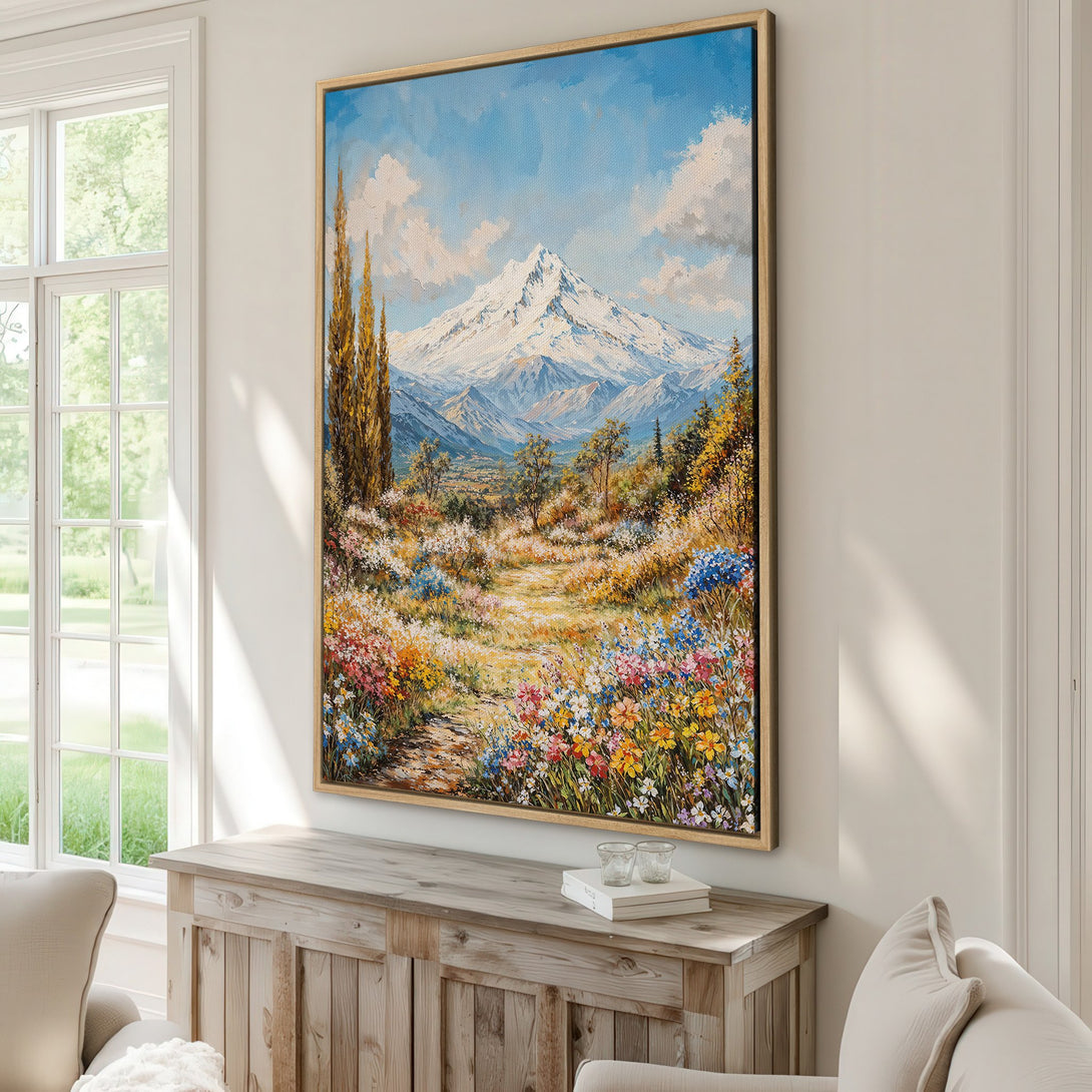 Framed Wall Art of a mountain landscape in a vibrant, impressionistic style. Featuring a colorful floral foreground and blue sky. Add art to your home today!