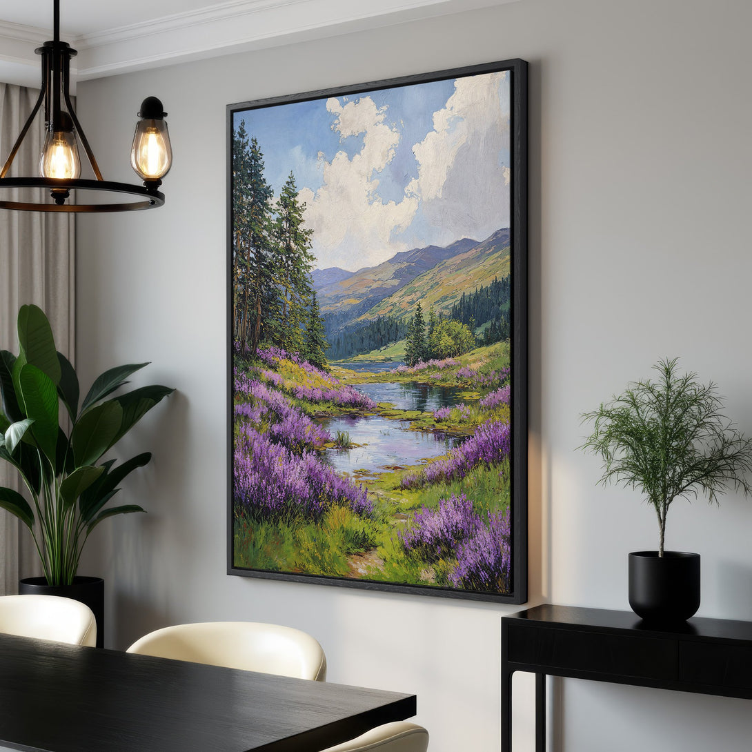 Framed Wall Art featuring a landscape painting with purple flowers, green hills, and a blue sky. Adds a pop of color and nature to any interior.