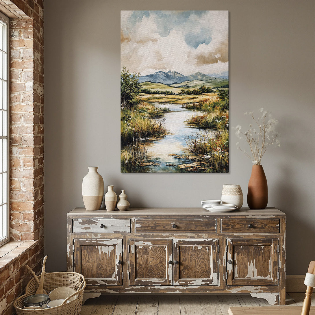 Framed Wall Art: Landscape Canvas Print with river and mountains. Soft watercolor style, featuring blue, green, and beige tones. Perfect for dining room decor.