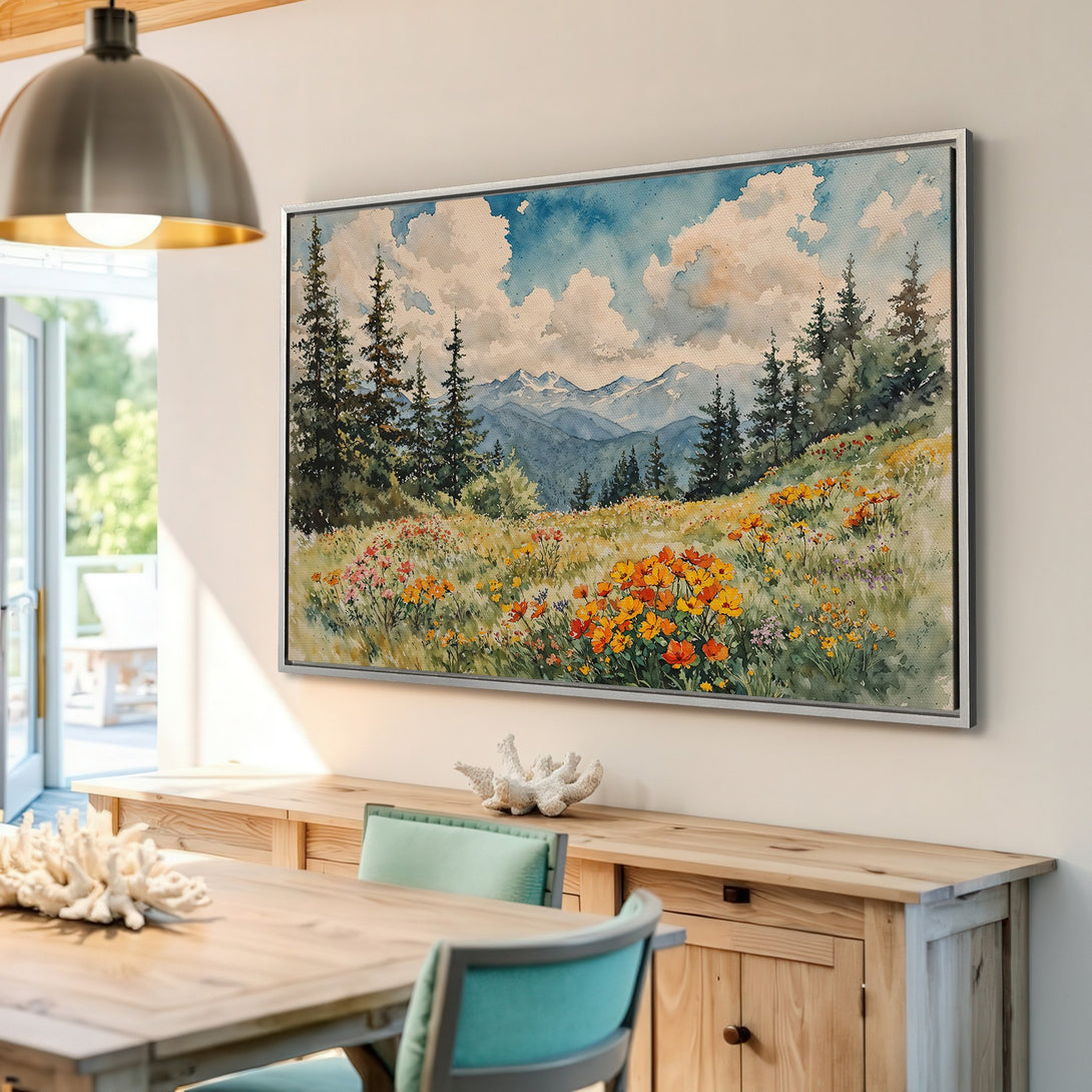 Framed Wall Art: Watercolor landscape Canvas Print with mountains, trees, and wildflowers. Serene, colorful artwork in a light blue, yellow, and green palette. Perfect for home decor.