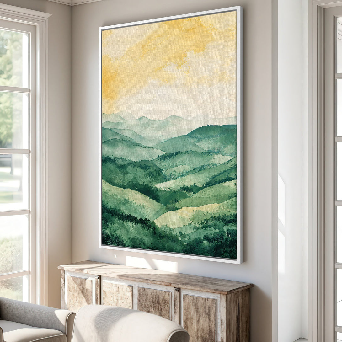 Framed Wall Art featuring a watercolor mountain landscape in green and yellow hues. Perfect for adding a touch of nature-inspired art to your home decor.