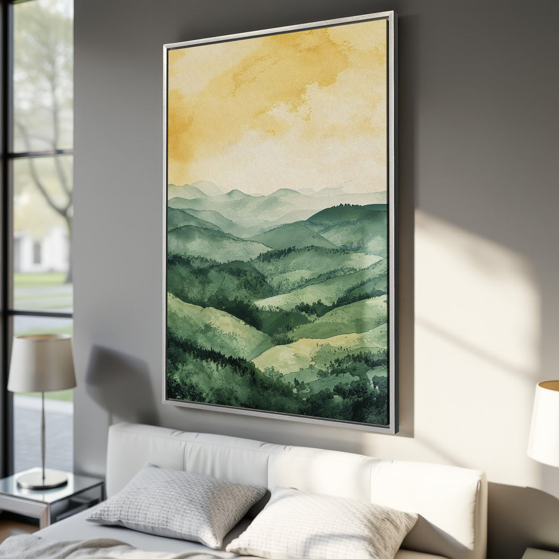 Framed Wall Art featuring a watercolor mountain landscape in shades of green and yellow. Perfect for adding a touch of nature-inspired art to any room.