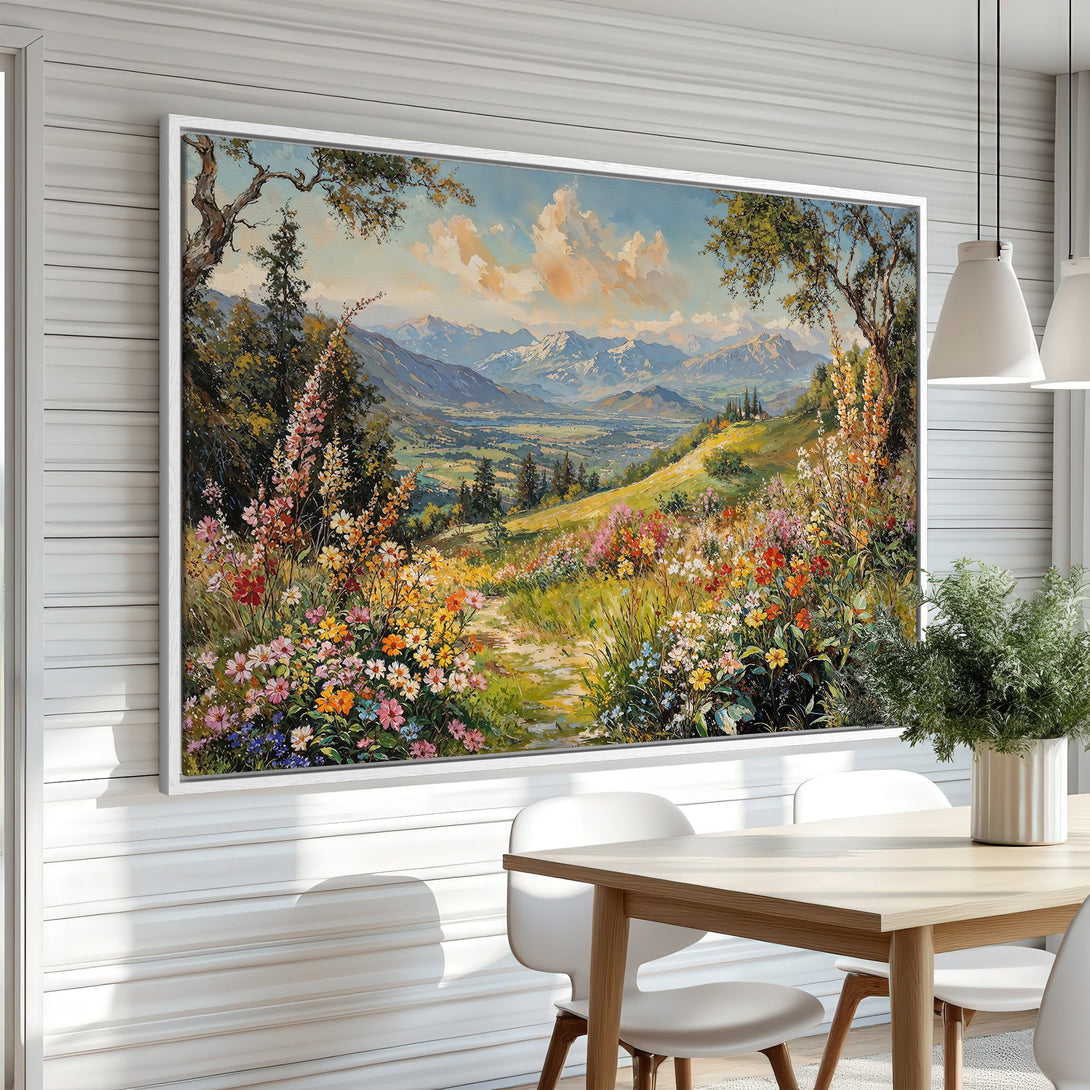 Framed Wall Art featuring a vibrant landscape painting with colorful wildflowers, mountains, and a path. Warm, inviting color palette. Perfect home decor.