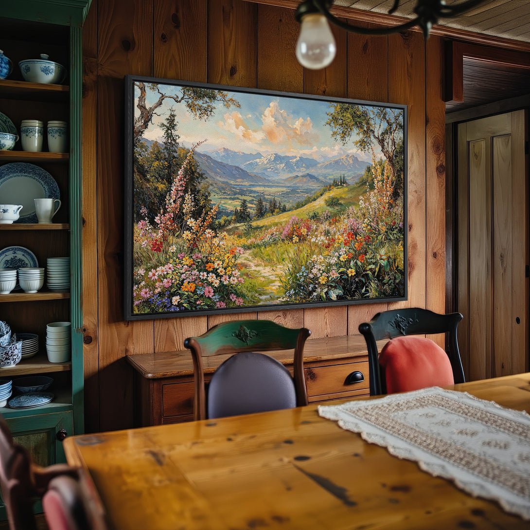 Framed Wall Art: Landscape painting with a colorful meadow and mountains. Warm, inviting colors in a cozy interior setting. Perfect for home decor.