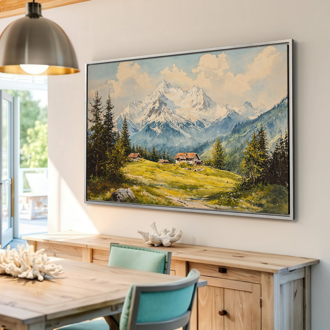 Framed Wall Art: Watercolor landscape of mountains & cabins in a warm, earthy palette. Perfect for adding a touch of nature to your home decor.