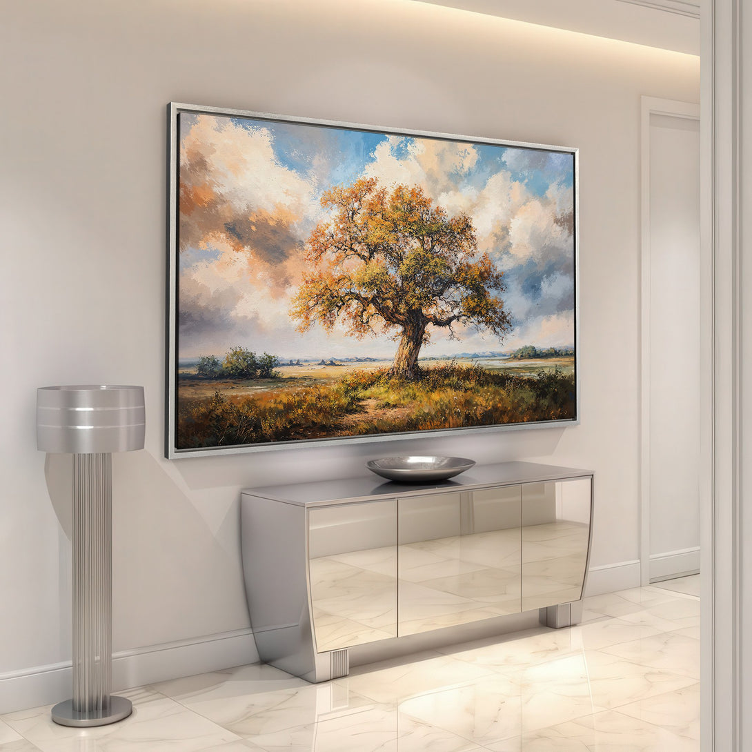 Framed Wall Art of a majestic tree in a landscape, showcasing warm earth tones and blue skies. Perfect for adding a touch of nature to your home.