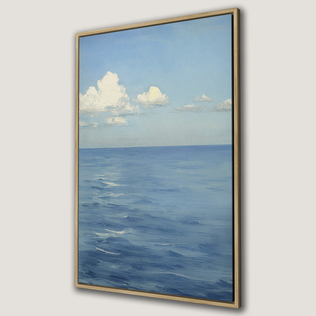 Framed Wall Art: Serene ocean landscape Canvas Print. Blue and white color palette, impressionistic style painting of sea and sky. Perfect for coastal decor.