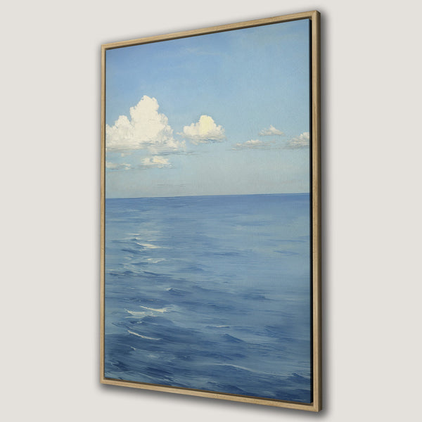 Framed Wall Art: Serene ocean landscape Canvas Print. Blue and white color palette, impressionistic style painting of sea and sky. Perfect for coastal decor.