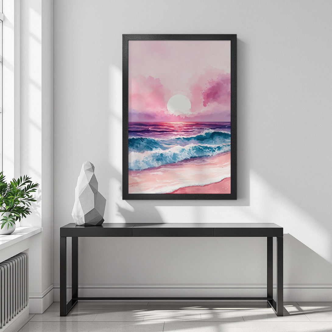 Framed Poster of a watercolor sunset over the ocean. Features pink, purple, and blue hues. Perfect wall art for a calming space.