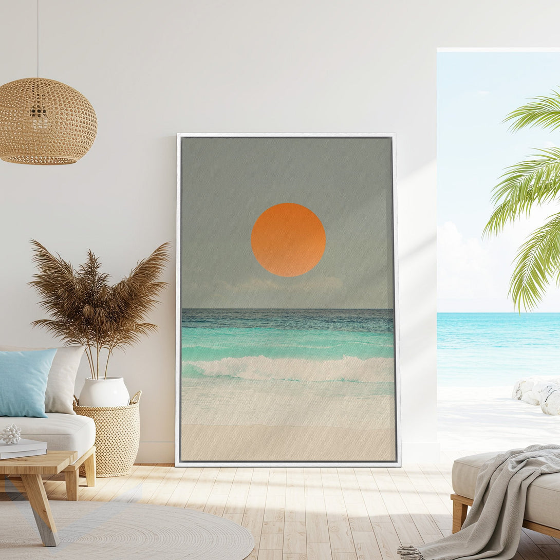 Framed Wall Art: Coastal sunset canvas print in a serene interior. Featuring a minimalist style with teal, orange, and neutral tones. Perfect for beach house decor.