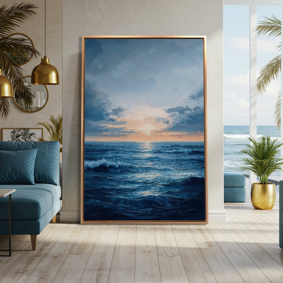 Framed Wall Art: Ocean sunset canvas print in blue and gold tones. Coastal wall decor perfect for a serene living room. Shop now for calming art!