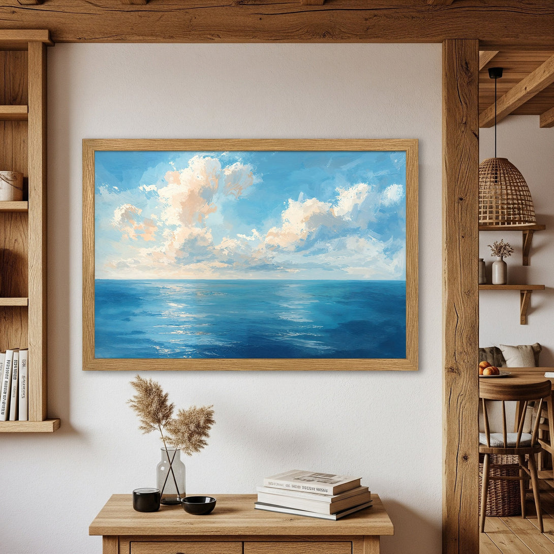 Framed Poster of ocean and sky in blue and white. Coastal art print, perfect for home decor.