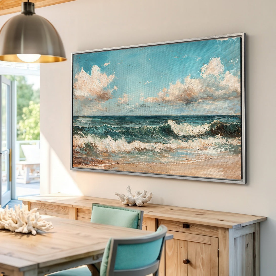 Framed Wall Art: Coastal scene Canvas Print with ocean waves, sky, and beach in a calming blue and beige palette. Perfect for a serene interior.