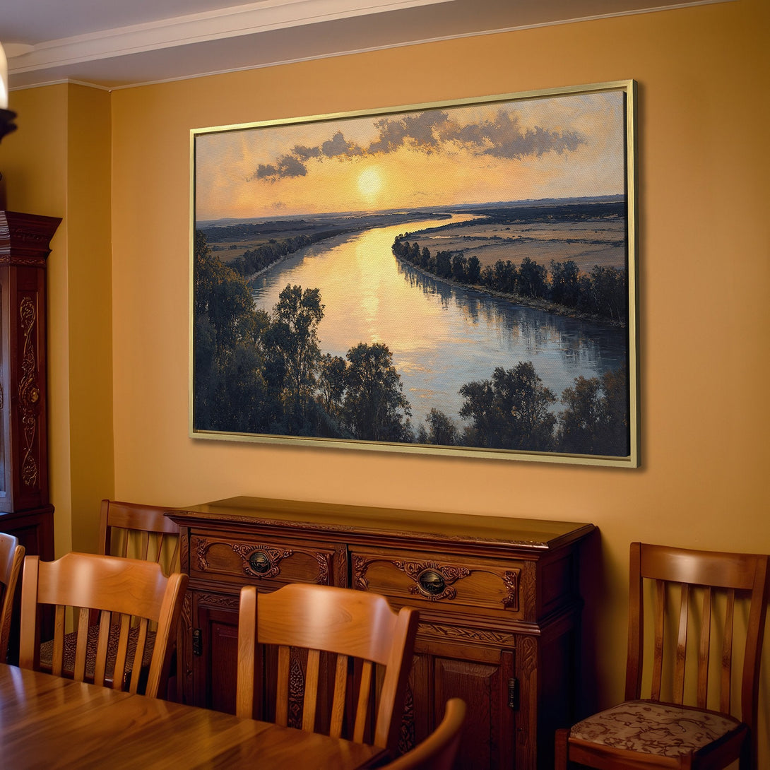 Canvas Print of a sunset over a river, displayed in a living room. Warm, inviting color palette with blues, yellows, and greens. Perfect wall art!