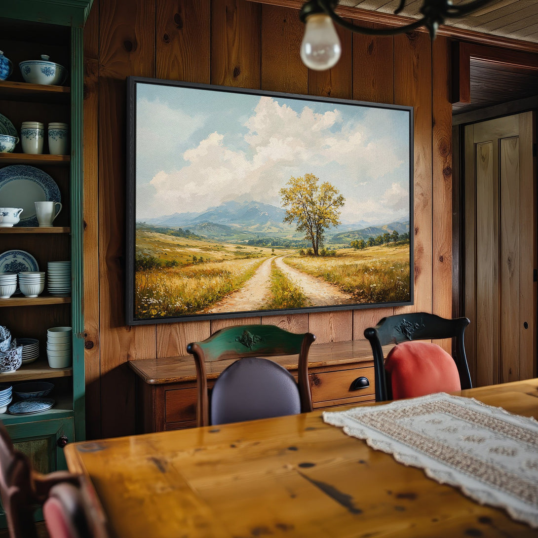 Framed Wall Art: Landscape Canvas Print in warm, earthy tones. Rustic style with a dirt road, tree, and mountains. Perfect for cozy interiors.