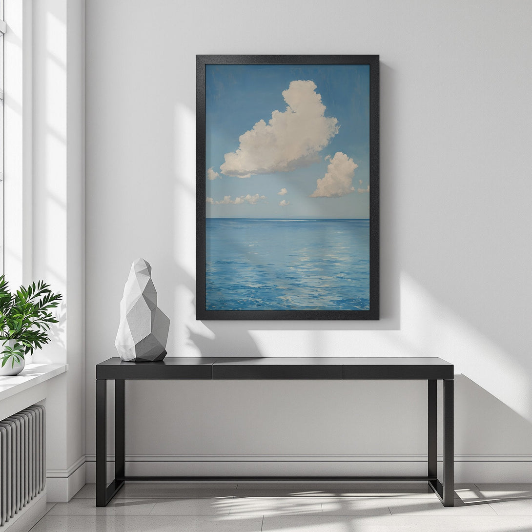 Framed Poster featuring a serene seascape with blue sky, clouds, and ocean. Calming art in a blue and white color palette. Perfect home decor.